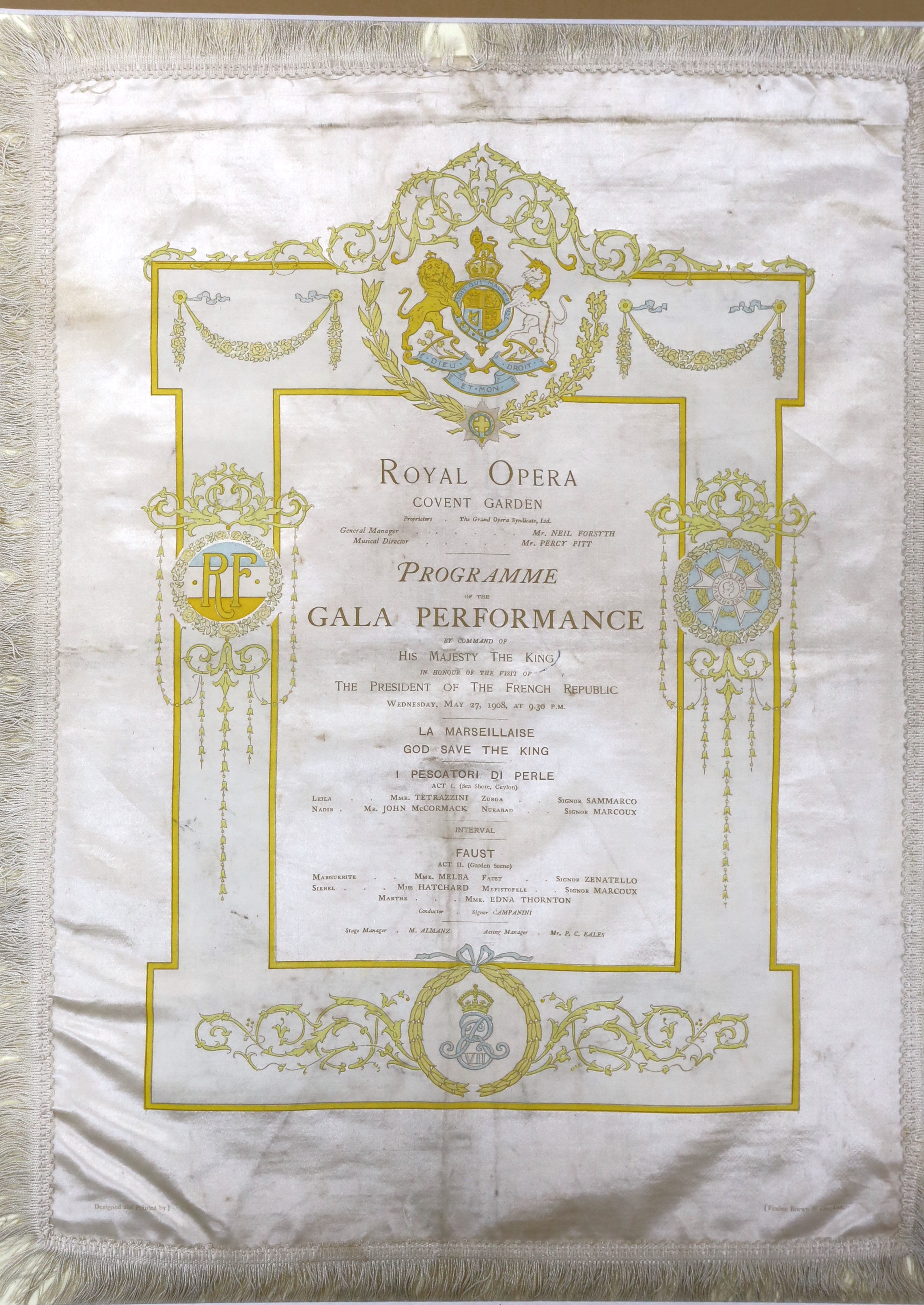 A framed early 20th century silk opera programme, Royal Opera House Covent Garden, Gala Performance 27th May 1908, printed by Finden Brown & Co., 38 x 28cm not including fringe